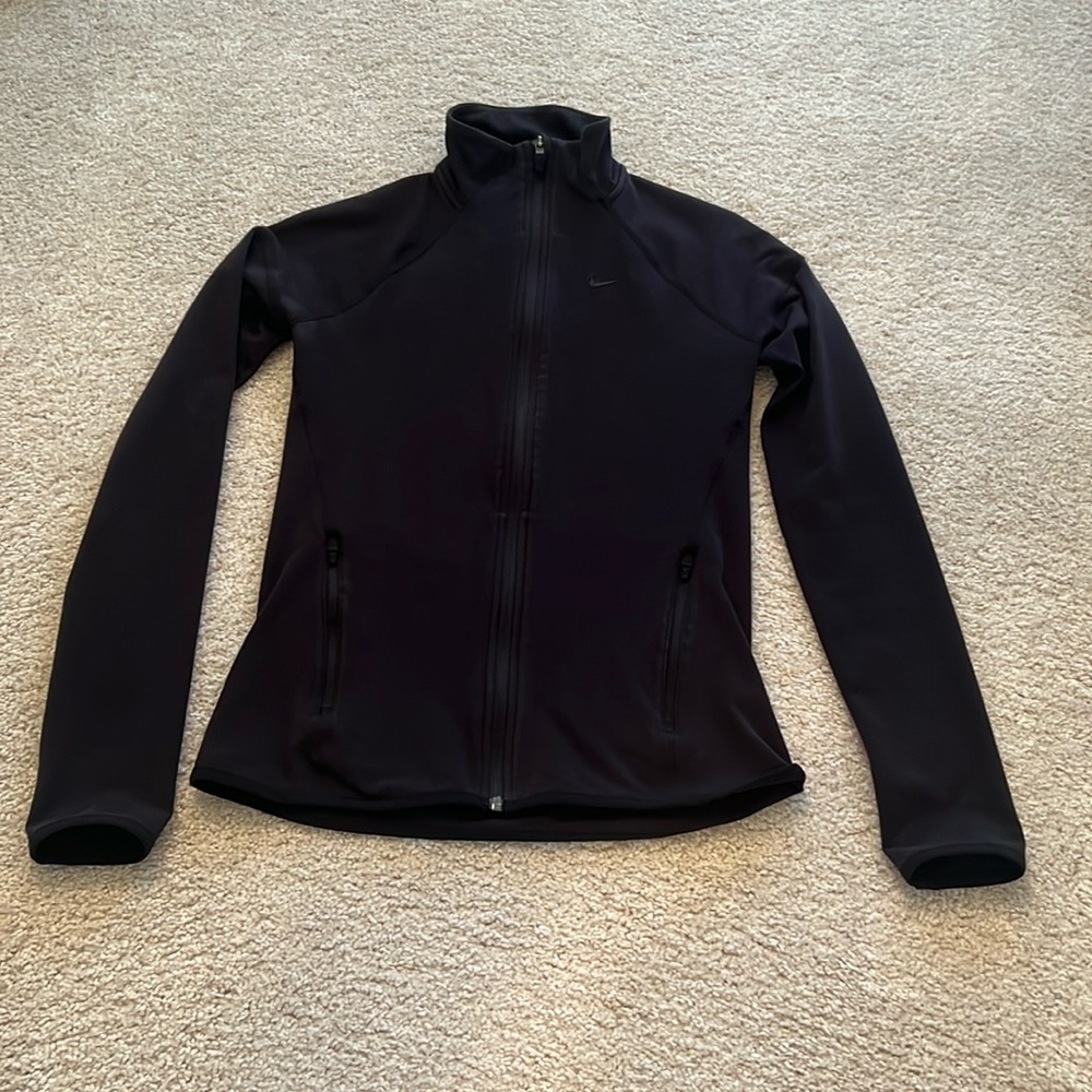 Nike slim fit jacket. Size M but fits more like a small.